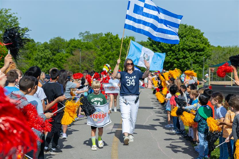 Students participate in flag parade